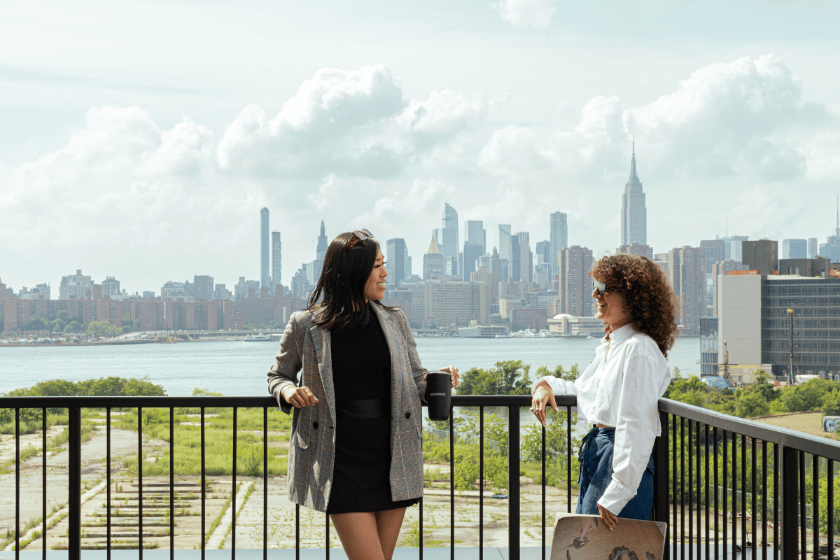 Furnished rooftop deck with Brooklyn and Manhattan skyline views
